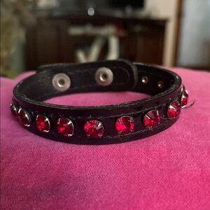 Elegant Black Bracelet with Red Accents